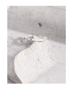 Macro shot of S925 sterling silver ring with micro-set rainbow cubic zirconia stones