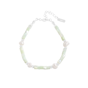 S925 silver bracelet with baroque pearls and light green beads on white background