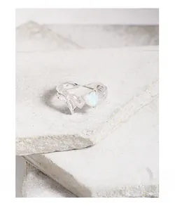 Detail of S925 silver heart opal ring featuring unique irregular lava texture finish