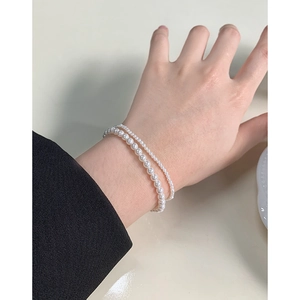 Elegant double-layered pearl bracelet featuring 2mm and 6mm white shell beads for women