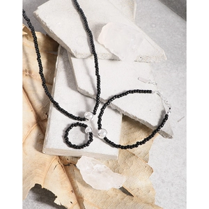 Minimalist S925 silver jewelry set featuring black agate beads on stone and autumn leaf