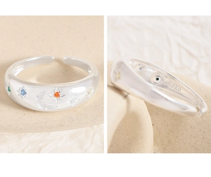 Macro shot of S925 sterling silver ring featuring colorful star and moon zircon stones