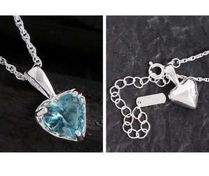 Vue détaillée du pendentif cœur en pierre bleue avec poinçon en argent sterling S925