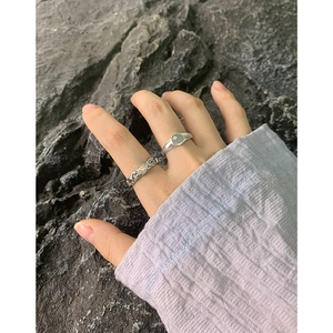 S925 sterling silver ring set with engraved star and oval opal stone on model hand