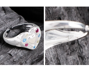 Detailed macro shot of S925 sterling silver heart ring with colorful zircon stones