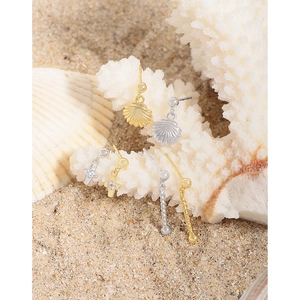 S925 silver cross and shell stud earrings set displayed on white coral branches