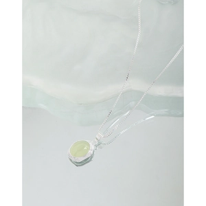 Irregular oval light green crystal pendant necklace on silver chain for women