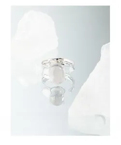 Macro detail of S925 silver ring featuring irregular textures and oval matte gemstone