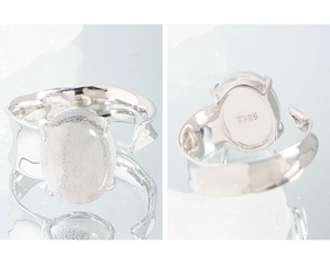 Detail showing S925 hallmark on wavy silver ring with frosted white oval stone