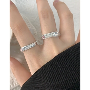 Minimalist S925 sterling silver geometric wavy rings with zircon stones on female hand