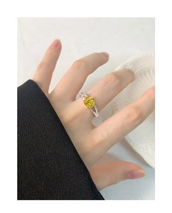 Close-up of an S925 sterling silver open ring with a detailed yellow rose on a finger