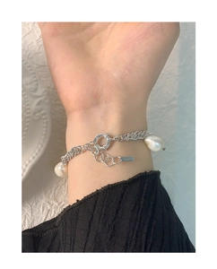 Detail of S925 sterling silver bracelet featuring baroque pearls and double-layer chain