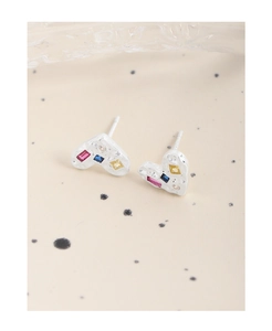 Close-up of heart-shaped S925 silver stud earrings with colorful cubic zirconia stones