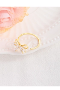 Detailed view of the S925 silver stamp on the inner band of the pearl bow open ring
