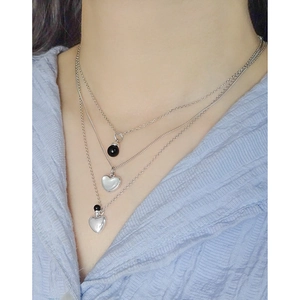Three-layer S925 sterling silver layered necklace with black bead and heart pendants