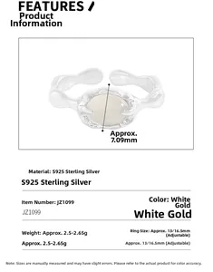 Detail of S925 sterling silver ring featuring oval moonstone and liquid texture band