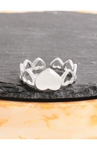 Detail of S925 silver adjustable ring featuring a white heart inlay and hollow heart band