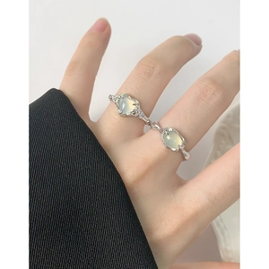 Minimalist S925 silver ring featuring fluid texture and oval green agate stone