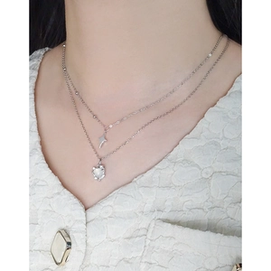 S925 sterling silver layered necklace with star and agate heart pendant on woman