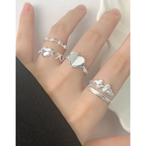 Minimalist S925 silver heart ring set for women featuring stackable romantic designs