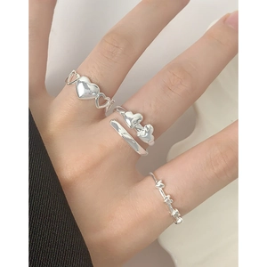 Minimalist S925 sterling silver heart ring set with elegant cutout and layered designs