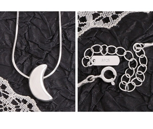 Detailed macro view of S925 sterling silver moon necklace lobster clasp and hallmarks