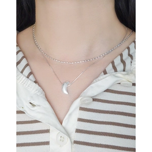 Minimalist S925 silver double layer necklace featuring a sleek crescent moon pendant on the neck
