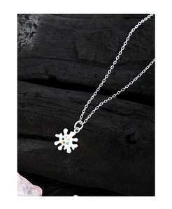 Detailed shot of S925 silver necklace featuring a colorful zircon snowflake pendant