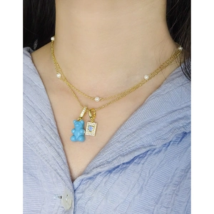 Double-layered gold necklace with blue gummy bear and heart zircon pendants for women