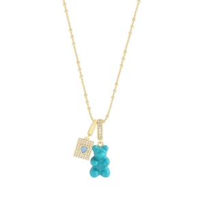 Elegant gold ball chain necklace with sparkling heart charm and blue teddy bear pendant