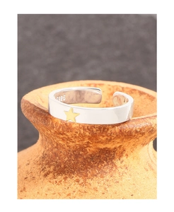 Macro detail of S925 sterling silver ring showing the internal hallmark and golden star