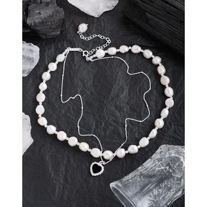 Double-layer S925 silver necklace with baroque pearls and a black heart-shaped pendant