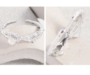 Detail of S925 silver irregular texture ring with moonstone and interior stamp