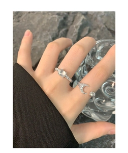 Macro view of S925 silver textured square agate ring and moon-shaped open ring detail