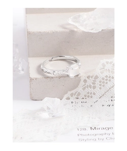 Close-up of S925 silver square agate ring with unique irregular hammered lava texture