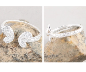 Detail of S925 sterling silver ring featuring unique hammer texture and hallmark stamp