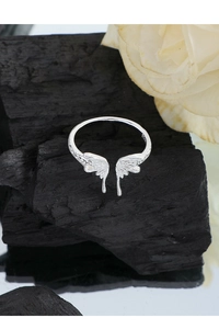 Macro shot of S925 sterling silver butterfly wing ring with fluid liquid metal texture