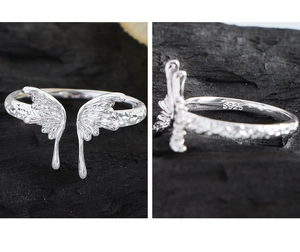Macro shot of S925 sterling silver butterfly ring showing unique wing texture and hallmark
