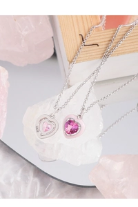 Detail of S925 silver necklaces featuring pink enamel heart pendants and zircon stones
