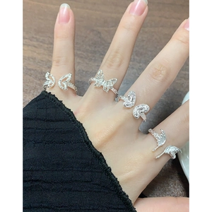 Adjustable S925 sterling silver butterfly and wing texture rings set on hand
