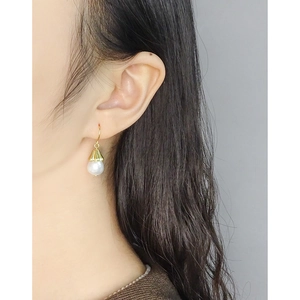 Minimalist S925 silver bell flower earrings with natural irregular pearls on model