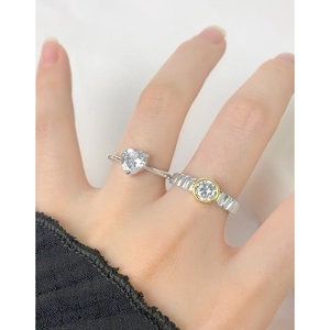 Set of two S925 silver rings with heart and round zircon stones in two-tone finish
