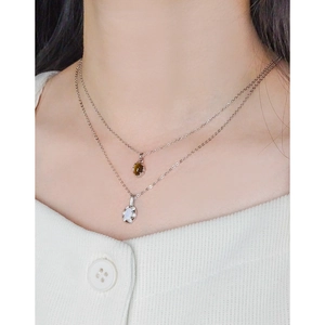 Minimalist S925 sterling silver layered necklace featuring oval tiger eye and flower pendant