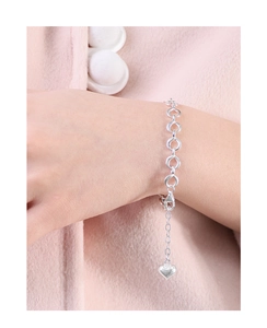 Silver link chain bracelet with heart charm and lobster clasp shown on wrist
