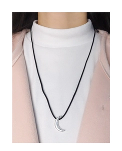 Close-up of S925 silver crescent moon pendant on an adjustable black cord necklace