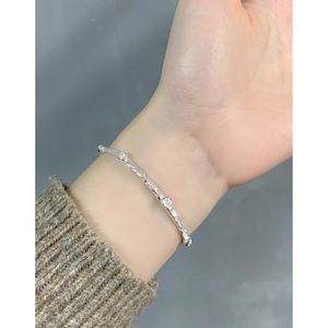 Minimalist S925 sterling silver textured cuff bracelet with small inlaid zircons on wrist