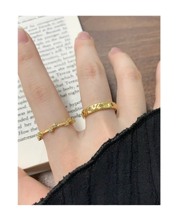 Stackable gold S925 silver rings with zircon accents and irregular hammered texture