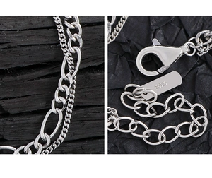 Macro detail of S925 sterling silver double layer chain necklace with lobster clasp