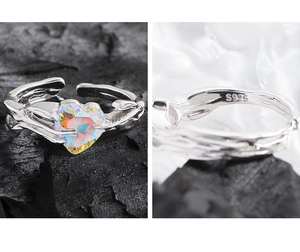 Macro detail of S925 sterling silver hallmark and colorful heart zircon stone ring