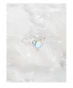 Macro detail of S925 sterling silver ring featuring iridescent heart-shaped zircon stone
